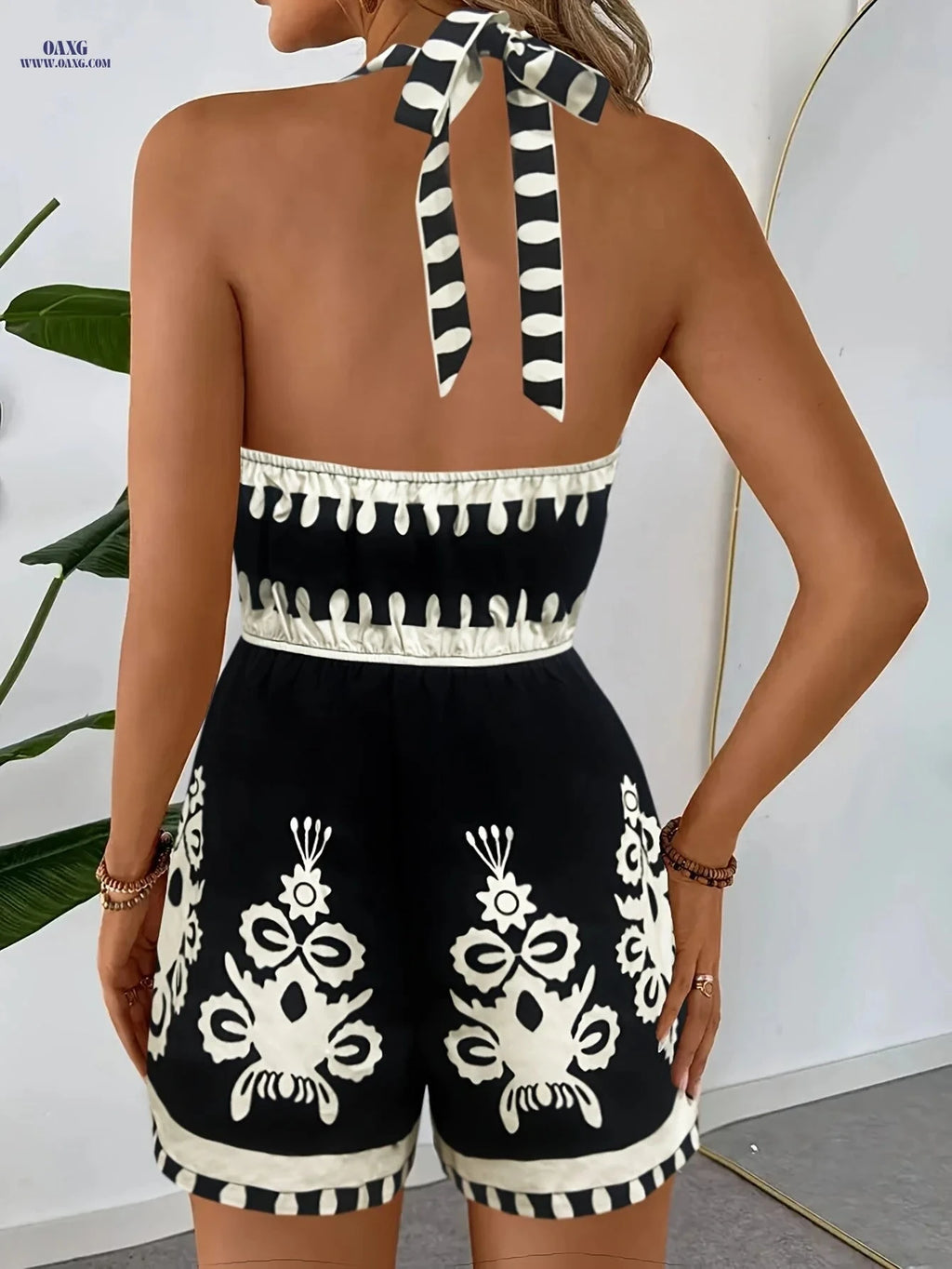 Elegant Black and White Printed Jumpsuit for Stylish Women   OAXG 