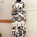 Elegant Black & White Floral Print Abaya - Long Sleeve, Stylish Belted Design   OAXG 