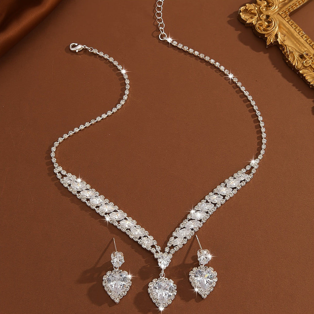 Ensemble de Bijoux Élégants - Boucles d'Oreilles et Collier Plaqué Argent   OAXG Silvery