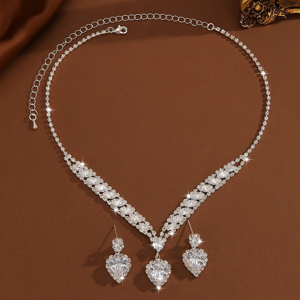 Ensemble de Bijoux Élégants - Boucles d'Oreilles et Collier Plaqué Argent   OAXG Silvery