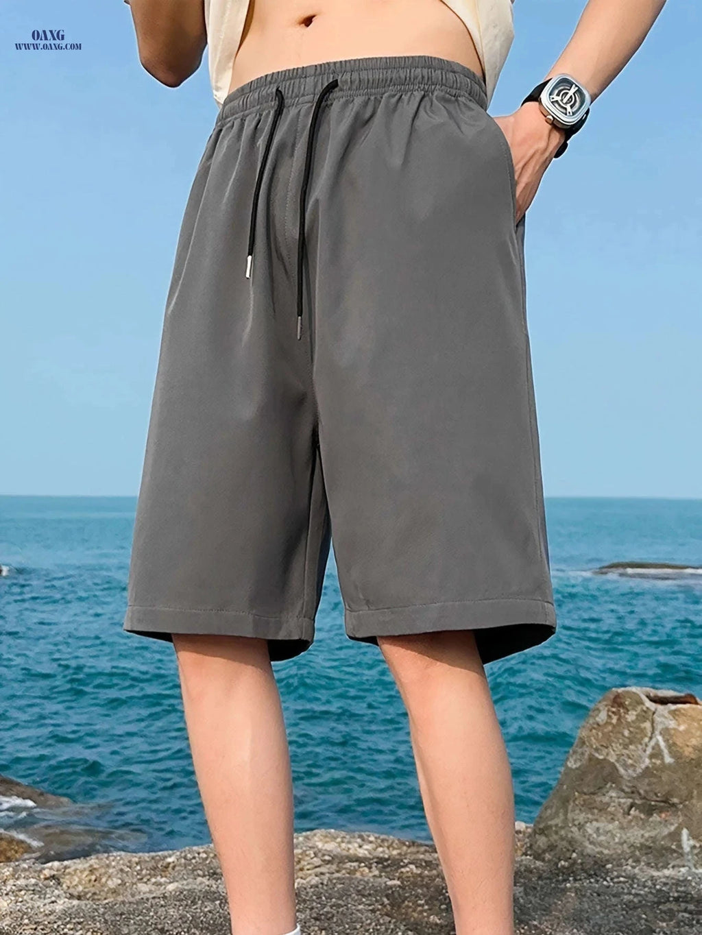 Men's Casual Elastic Waist Shorts with Pockets - Solid Color   OAXG 
