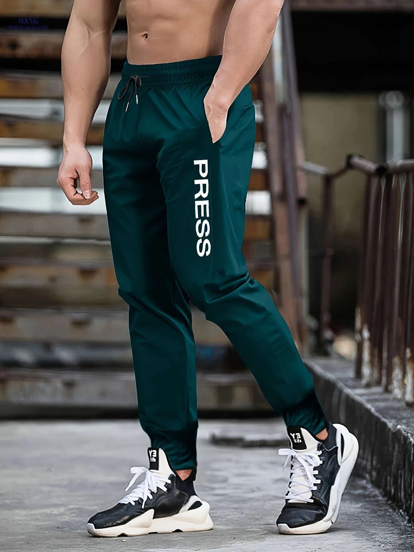 Men's Casual Sports 9-Inch Pants - 100% Polyester, Slight Stretch   OAXG 